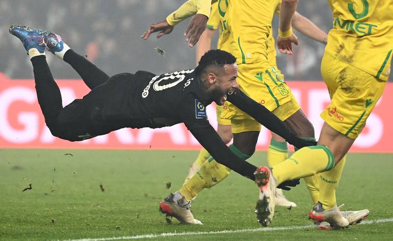 Paris Saint-Germain's Brazilian forward Neymar takes a tumble. AFP