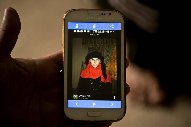 ISIL militants took this photo of Yazidi Nazdar Murat as part of a database they have put together of enslaved Yazidi girls and women they have enslaved. Maya Alleruzzo/AP Photo