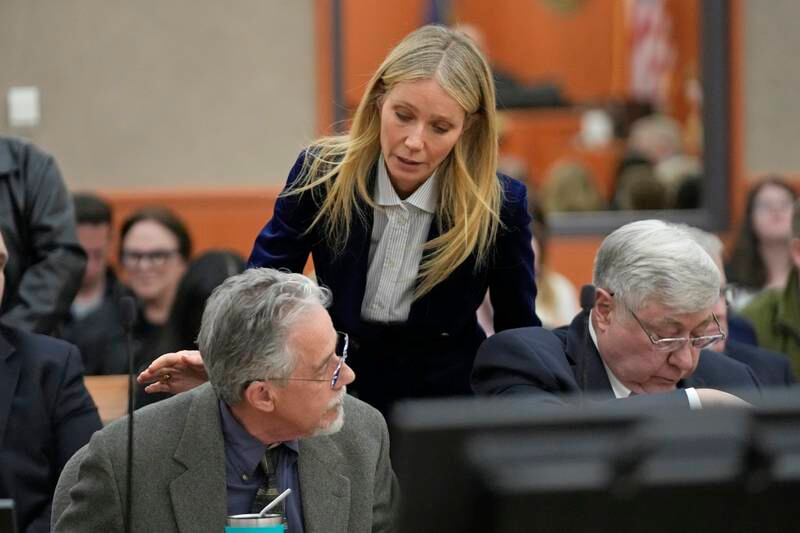 Gwyneth Paltrow speaks with retired optometrist, Terry Sanderson, after the verdict in 2016 ski crash trial, in Park City, Utah. EPA