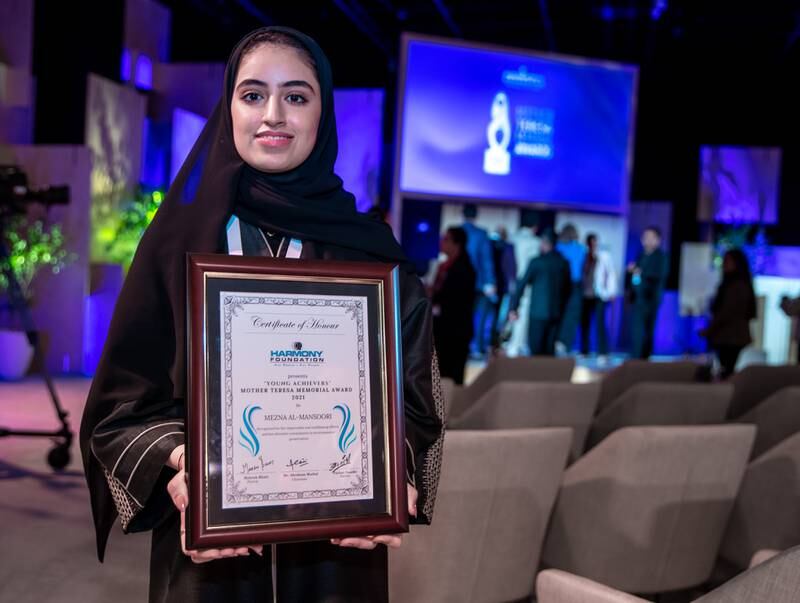 Mezna Al Mansoori with her Young Achievers Mother Teresa award. Victor Besa / The National