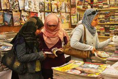 Women browse at the international book fair in Cairo.