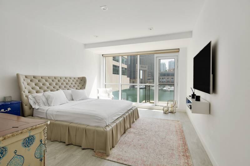 One of three spacious bedrooms with water views.