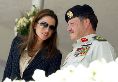 AMMAN, JORDAN - JUNE 10:  Jordan's King Abdullah (R) and his wife Queen Rania attend a ceremony to mark Army Day at the Unknown Soldiers monument June 10, 2002 in Amman, Jordan. The King and his wife Queen Rania left June 10, 2002 for Brussels to start a European tour, that includes Britain and France, to look for support to revive peace talks between Israel and the Palestinians.  (Photo by Getty Images)