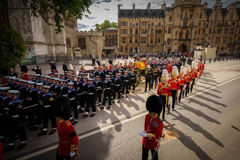 The coffin of the queen is pulled on a gun carriage by Royal Navy sailors from Westminster Abbey. Getty Images