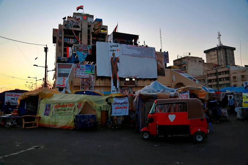Protesters stage a sit-in in Tahrir Square during anti-government demonstrations in Baghdad. AP