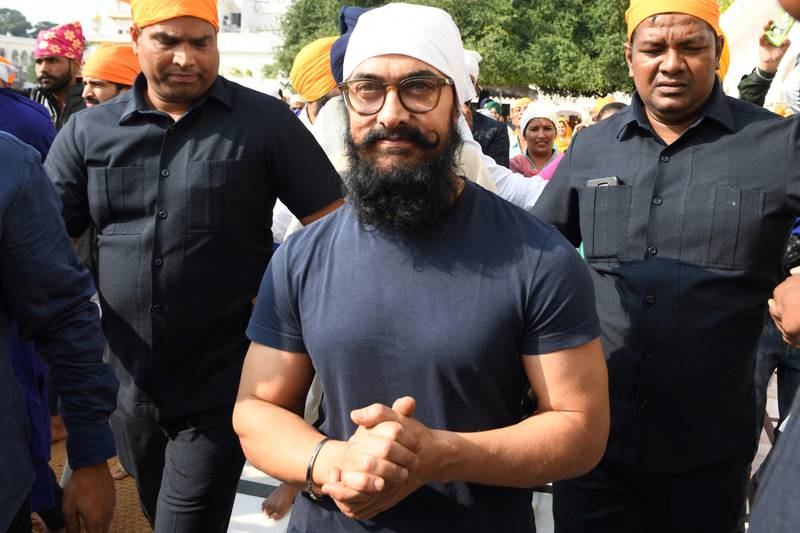 Aamir Khan pays his respects at the Golden Temple while filming 'Laal Singh Chaddha' in Amritsar. AFP