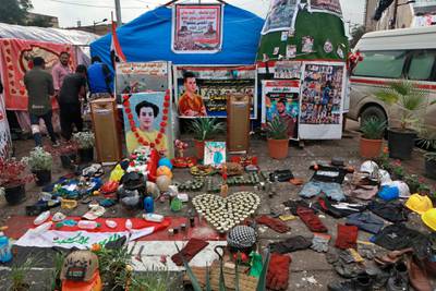 Posters of protesters who have been killed in demonstrations and their belongings are displayed in Tahrir Square during ongoing anti-government protests in Baghdad. AP Photo