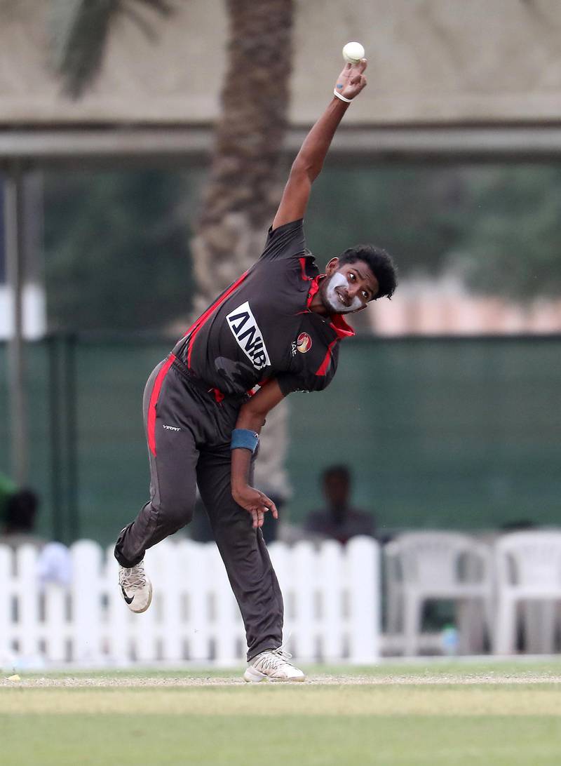 DUBAI, UNITED ARAB EMIRATES , Dec 15– 2019 :- Palaniapan Meiyappan of UAE bowling during the World Cup League 2 cricket match between UAE vs Scotland held at ICC academy in Dubai. He took 2 wickets in this match. ( Pawan Singh / The National )  For Sports. Story by Paul