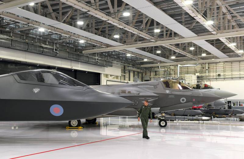 RBHA5R Team Tempest Programme Director Jez Holmes inspects a protoype of a Tempest stealth fighter jet at RAF Marham in Norfolk where Defence Secretary Gavin Williamson made announcements about the RAF's fighter jets.