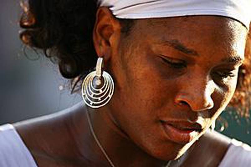 Serena Williams looks pensive during her unconvincing win over Zheng Jie at the Sony Ericsson Open.