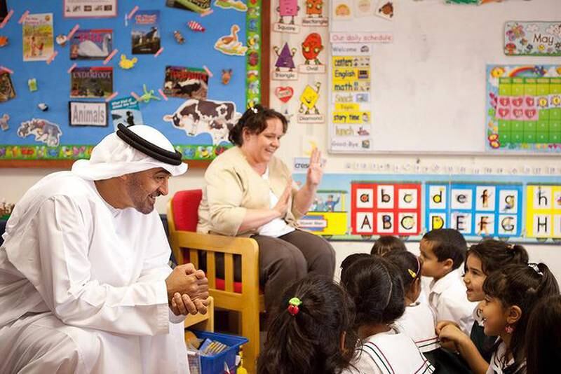 Mohamed bin Zayed speaks to young pupils in their classroom. Photo: Mohamed bin Zayed Instagram