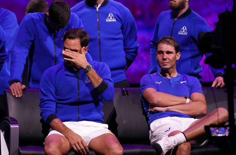 Roger Federer wipes away his tears at the O2 Arena in London. PA