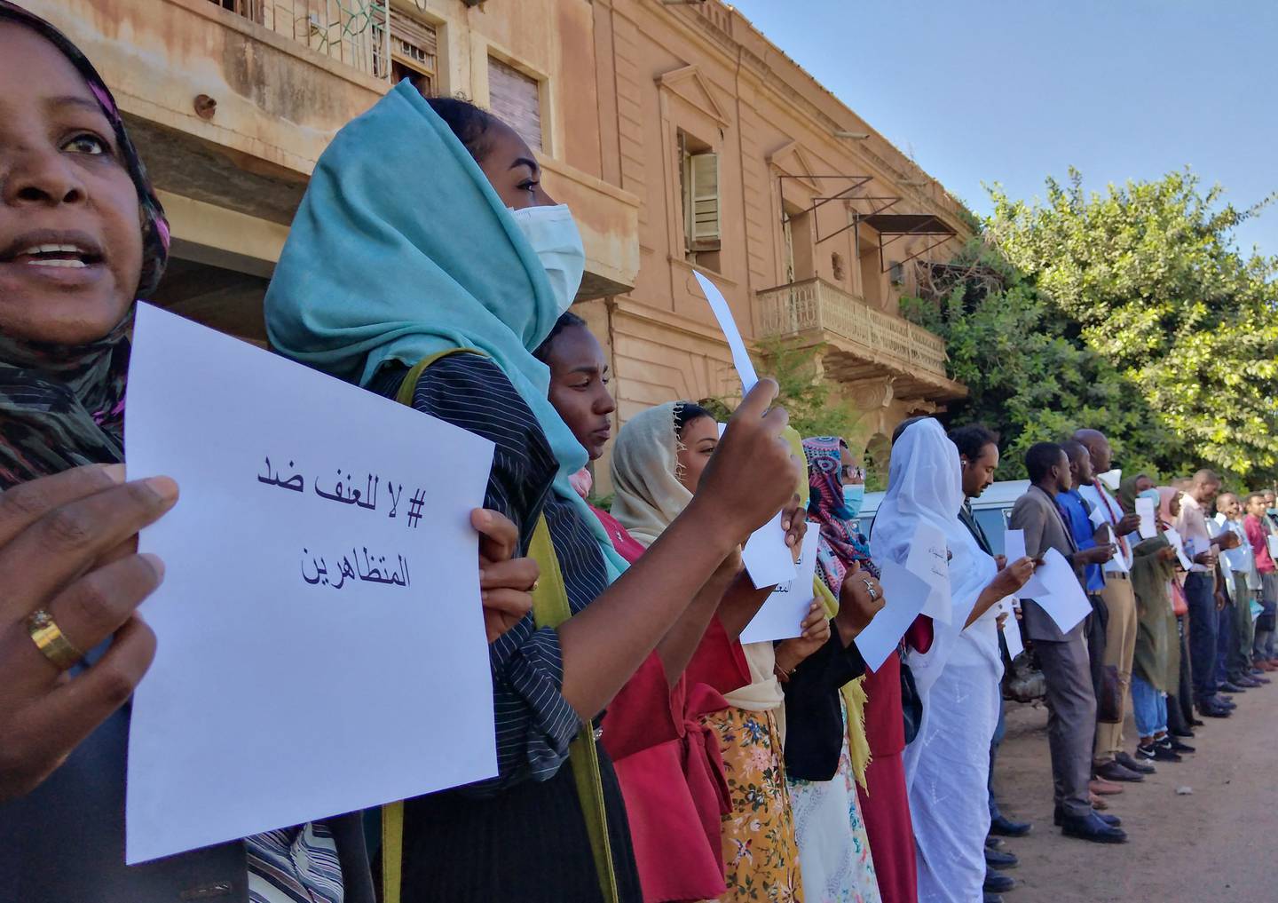 Sudanese lawyers brandish signs demanding accountability for perpetrators of violence against protesters, in the capital Khartoum. AFP
