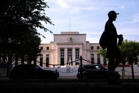 The Federal Reserve building in Washington. Wall Street ended higher on Friday on growing optimism that the Fed will finally hit the brakes on raising interest rates. Bloomberg