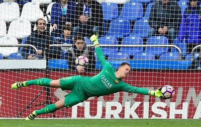 Barcelona’s German goalkeeper Marc-Andre ter Stegen dives to stop the ball. Miguel Riopa / AFP