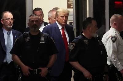 Mr Trump arrives at Manhattan Criminal Court in New York City. Reuters