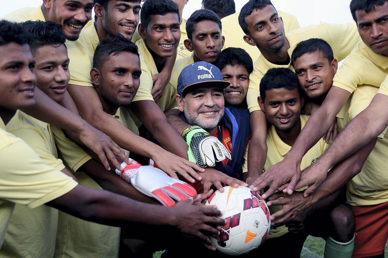 Fujairah, March 13, 2018: Football Legend Diego Maradona pose with Special Olympics Bangladesh Football team at the Fujairah Stadium in Fujairah . Satish Kumar for the National/ Story by Ruba Haza