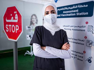 Mariam AlBadi an Emirati nurse at the  SEHA Covid-19 Drive-Through Service Center at the Corniche in Abu Dhabi on June 17th, 2021.  There is a huge demand for vaccinations and PCRs after the green pass restrictions. Victor Besa / The National.Reporter: Shireena Al Nowais for News