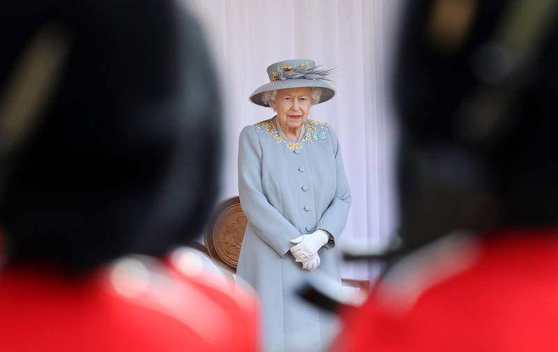 The smaller ceremony took place instead of Trooping the Colour, which traditionally is held at Buckingham Palace to mark the Queen's official birthday. AFP