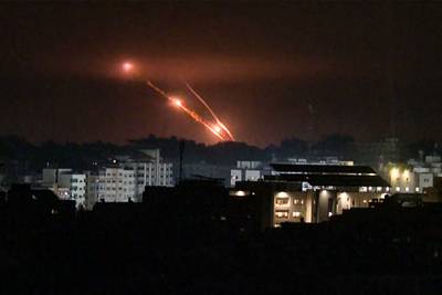 A video grab shows a salvo of rockets fired from Gaza city. AFP