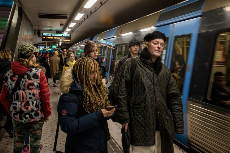 STOCKHOLM- SWEDEN - DECEMBER 4: Passengers are waiting on the platform at the T-centralen station to board the metro on December 4, 2020 in Stockholm, Sweden. Despite government guidelines regarding social distancing and avoiding large crowds, the metro stations are full of passengers crowded on the platforms. Over 7,000 people have died of COVID-19 in Sweden, giving the country of 10.2 million one of Europe's highest death rates per capita. (Photo by Jonas Gratzer/Getty Images)