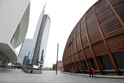 People go about Piazza Gae Aulenti in Milan. AFP