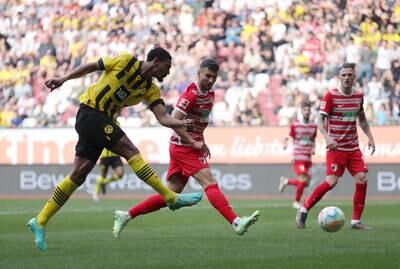Borussia Dortmund's Sebastien Haller scores their first goal. Reuters