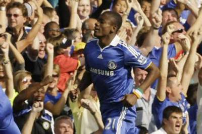 Chelsea's Salomon Kalou celebrates scoring against Manchester United at Stamford Bridge, a goal which keeps his team's unbeaten home record to 85 matches.