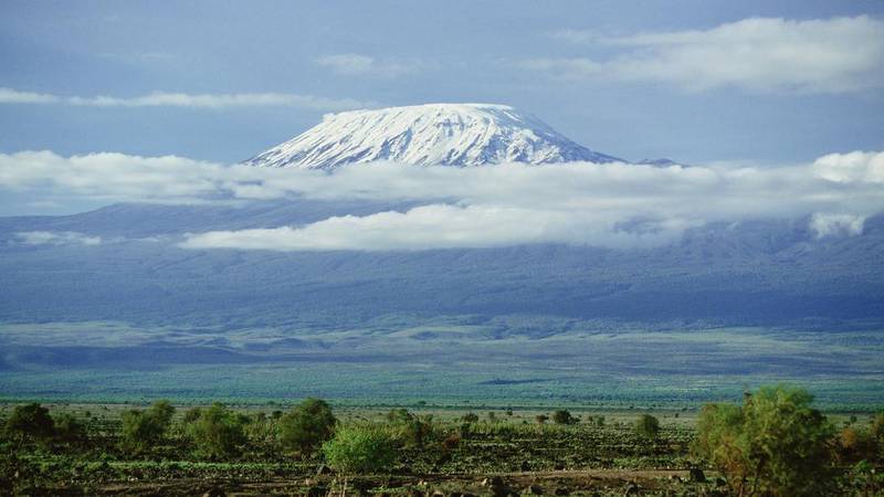 Standing on Mount Kilimanjaro, the roof of Africa, would have been impossible with children - the ultimate party-poopers / Getty