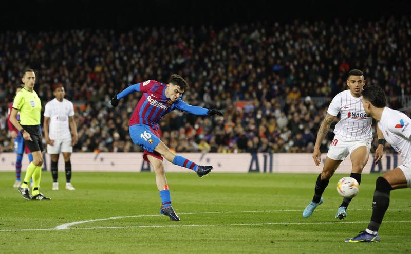 Pedri shoots to score for Barcelona against Sevilla. Reuters