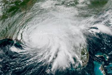 This GOES-16 GeoColor satellite image taken Tuesday, Sept. 15, 2020, at 3 p.m. EDT., and provided by NOAA, shows Hurricane Sally moving slowly towards the coast from the Gulf of Mexico. Forecasters now expect landfall late Tuesday or early Wednesday near the Alabama-Mississippi state line. (NOAA via AP)