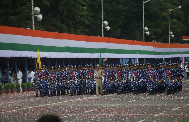 Kolkata police officers from the Rapid Action Force squad members march at Independence Day celebrations along Red Road in Kolkata. EPA