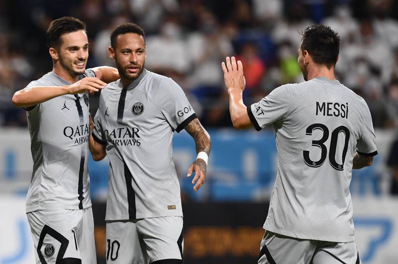 Pablo Sarabia, left, celebrates with Neymar and Lionel Messi after scoring the opening goal. AFP