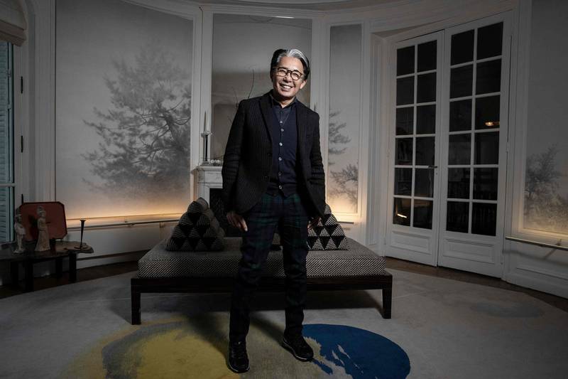 Japanese fashion designer Kenzo Takada posing during a photo session in his home in Paris on January 9, 2019. AFP