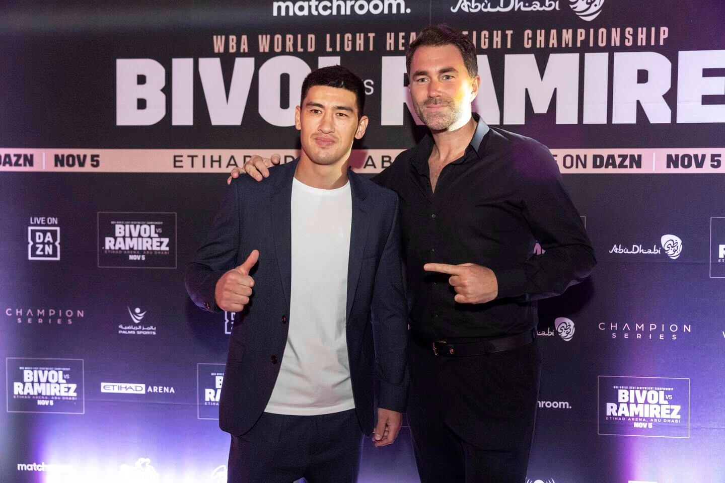 Eddie Hearn with Dimitry Bivol at a launch party in Abu Dhabi. Antonie Robertson / The National
