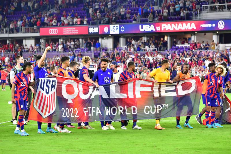 United States players celebrate after the match  that all but confirmed their place in the finals in Qatar. AFP