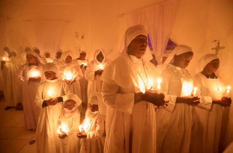 Christians attend the Christmas Eve vigil Mass at the Legio Maria African Mission in Nairobi, Kenya. Reuters