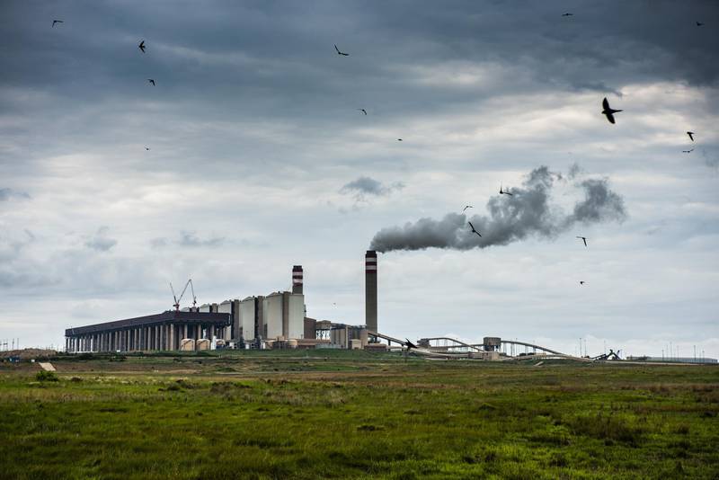 Emissions rise from a tower of the Eskom Holdings SOC Ltd. Kusile coal-fired power station in Mpumalanga, South Africa, on Monday, Dec. 23, 2019. The level of sulfur dioxide emissions in the Kriel area in Mpumalanga province only lags the Norilsk Nickel metal complex in the Russian town of Norilsk, the environmental group Greenpeace said in a statement, citing 2018 data from NASA satellites. Photographer: Waldo Swiegers/Bloomberg