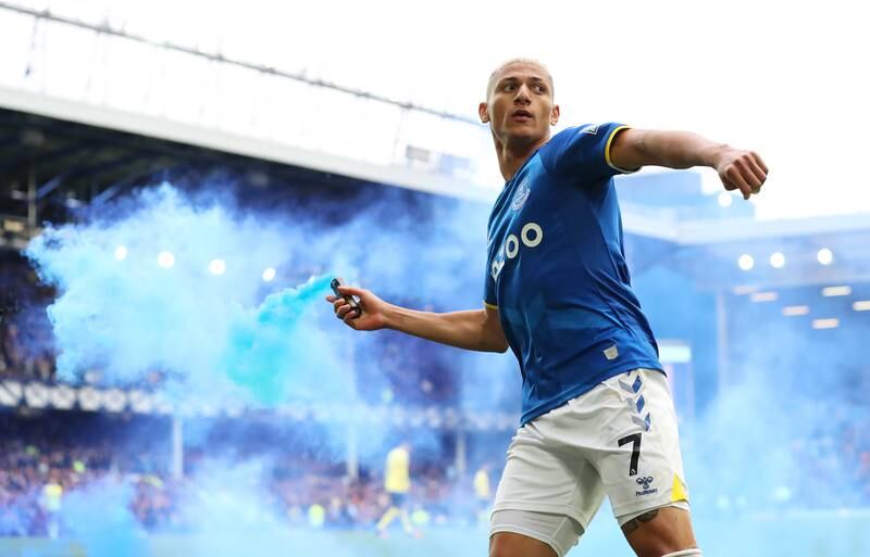 Everton attacker Richarlison celebrates with a flare after scoring the only goal of the game against Chelsea at Goodison Park on Sunday, May 1, 2022. Getty