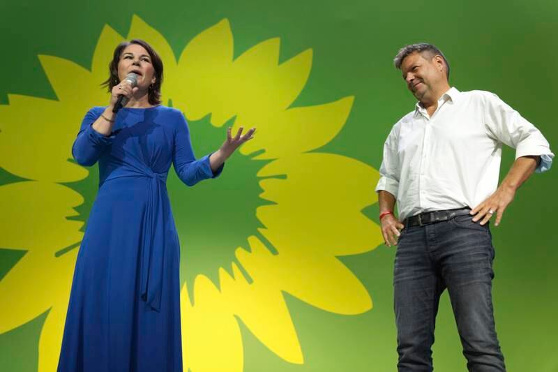 Annalena Baerbock, Green party co-leader and candidate for chancellor, with her fellow leader Robert Habeck, at their election party in Berlin. AP