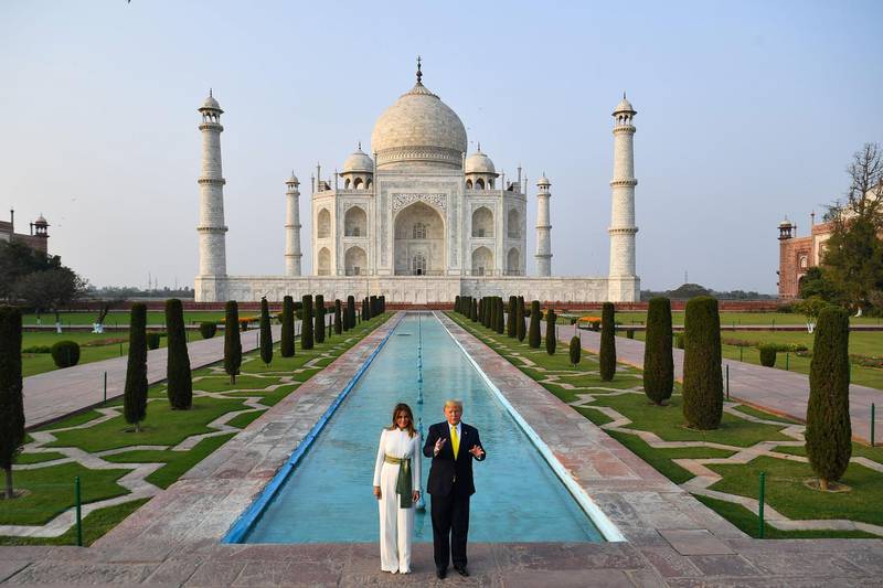 US President Donald Trump and First Lady Melania Trump stand in front of Taj Mahal.