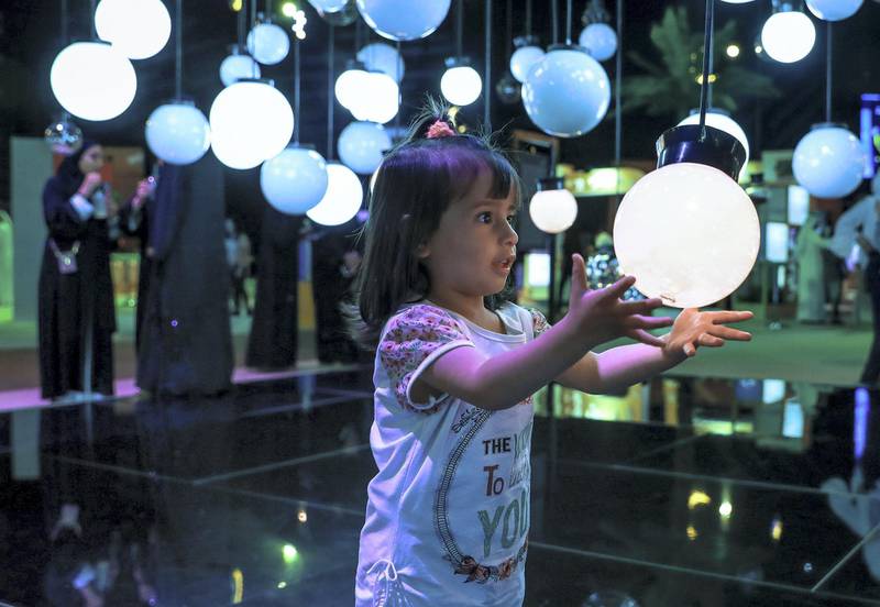 Abu Dhabi, U.A.E., May 30, 2018.  Ramadan Exhibition at ADNEC.  Ramadan lighting exhibition attracts a little girl.Victor Besa / The NationalReporter:  Saeed SaeedSection:  Arts & Culture