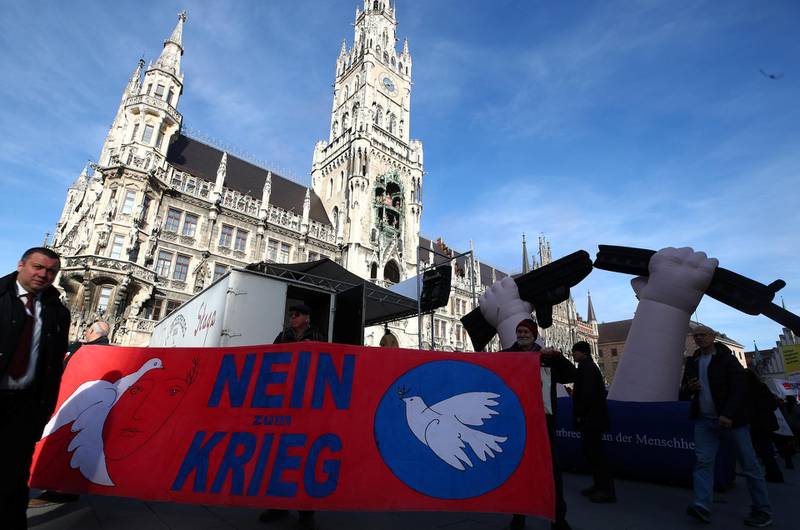 Demonstrators hold a banner stating "No to war", at a protest against the annual security conference in Munich, Germany. REUTERS