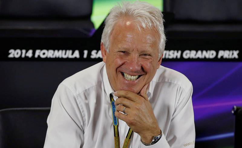 FILE PHOTO: Federation Internationale de l'Automobile (FIA) race director Charlie Whiting laughs during a media question and answer session ahead of the British Grand Prix at the Silverstone race circuit, central England, July 3, 2014. REUTERS/Phil Noble/File Photo