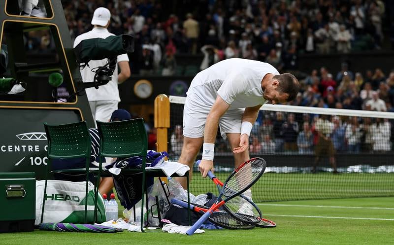 Andy Murray of Great Britain reacts  after losing against John Isner of United States at All England Lawn Tennis and Croquet Club on June 29, 2022 in London, England. Getty Images