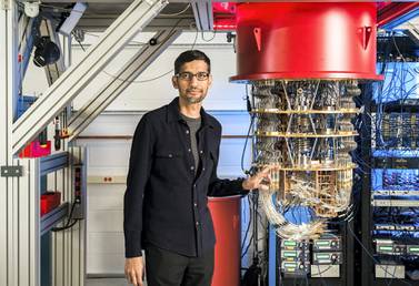 Sundar Pichai, chief executive Alphabet Inc and its subsidiary Google, with one of Google's quantum computers. AFP