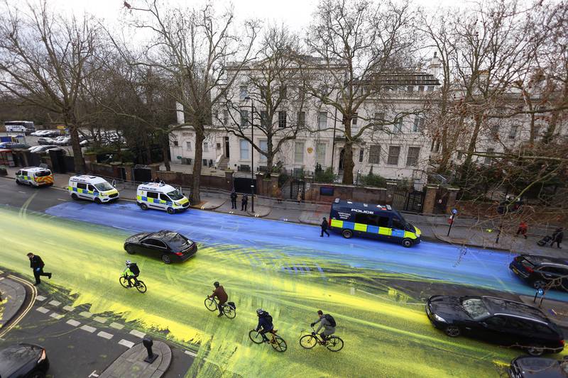The protest group Led by Donkeys has spread paint in the colours of the Ukrainian flag on the road outside the Russian embassy in London. All photos: Reuters