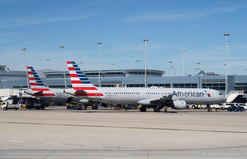 (FILES) In this file photo taken on February 15, 2017 American Airlines planes sit at the gate on the tarmac of McCarran International Airport in Las Vegas, Nevada.
American Airlines has ordered 47 Boeing 787 Dreamliners in an order valued at $12 billion at list prices, while cancelling a major order for Airbus A350s.  / AFP PHOTO / RHONA WISE
