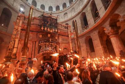 Worshippers at Jerusalem's Holy Sepulchre church. AFP