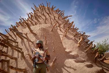 A Malian soldier guards the Tomb of Askia, an archaeological site in Gao. AFP